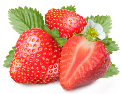 Whole and sliced ripe strawberries.