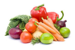 Grouping of various vegetables, carrots, onions, cabbage, tomato and beets.