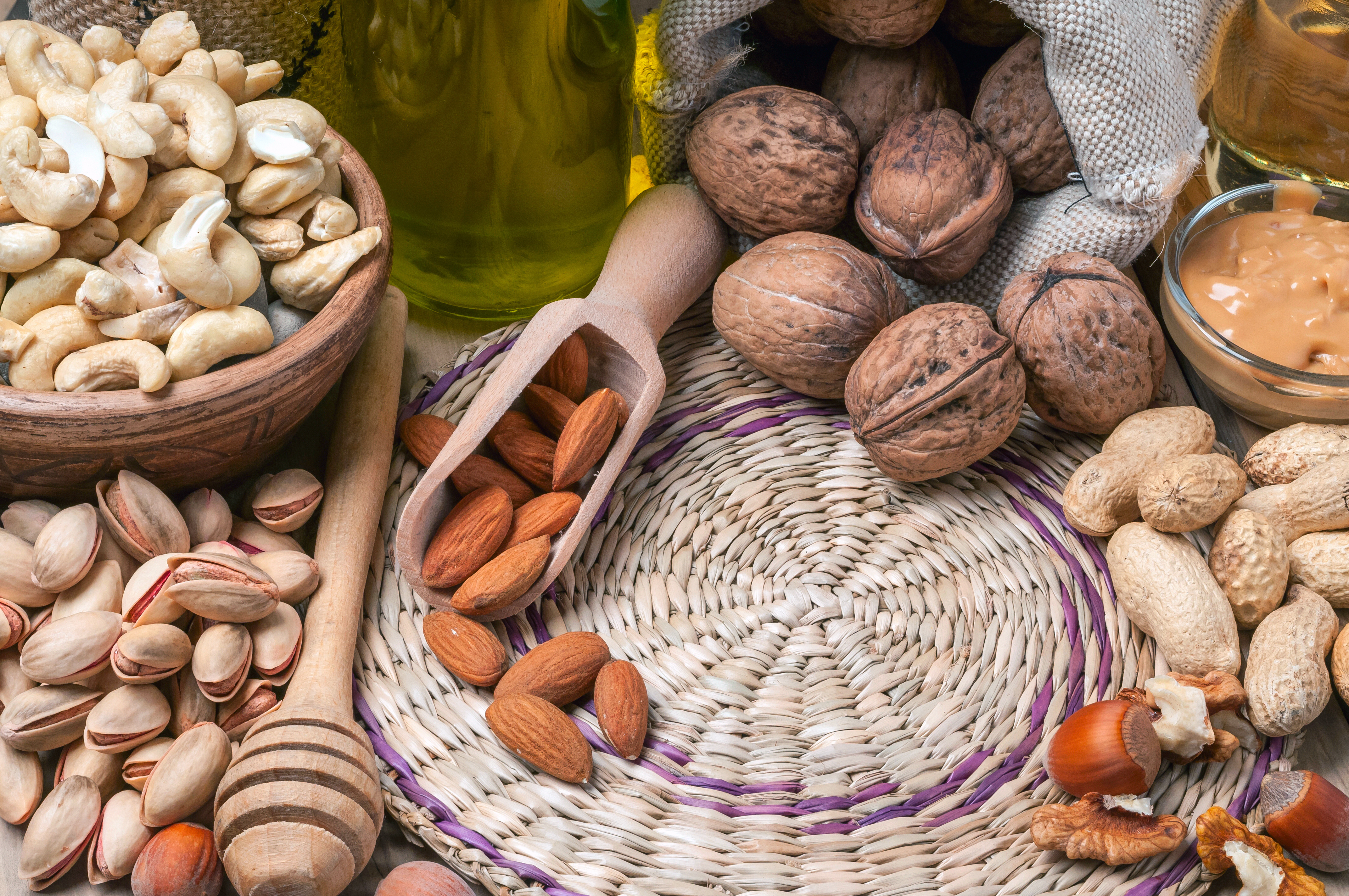 tree nuts in a grouping, walnuts, almonds, peanuts