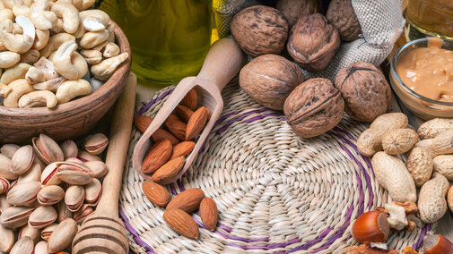 tree nuts in a grouping, walnuts, almonds, peanuts