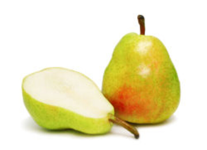 photo of whole and halved pear